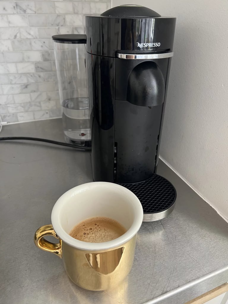 Nespresso Vertuo Plus Deluxe Coffee and Espresso Maker ($160, originally $250)
Getting nearly half off a Nespresso machine feels like a damn steal if I've ever heard one. This device is both editor- and Amazon shopper-loved, and it makes a mean cappuccino. Learn more in our Nespresso Vertuo Plus Deluxe Coffee and Espresso Maker review.
Editor Quote: "The machine makes multiple coffees a day for my roommates and I, and it never fizzes out or gets overwhelemed. This is the perfect coffee maker if you want something that you can just press and go. You can adjust the height of the ledge for your coffee mug, and the machine will program how large to make your coffee based on the pod and the mug size. If you want more, you can always push the button again, and it will top it off." — India Yaffe, former associate shopping editor