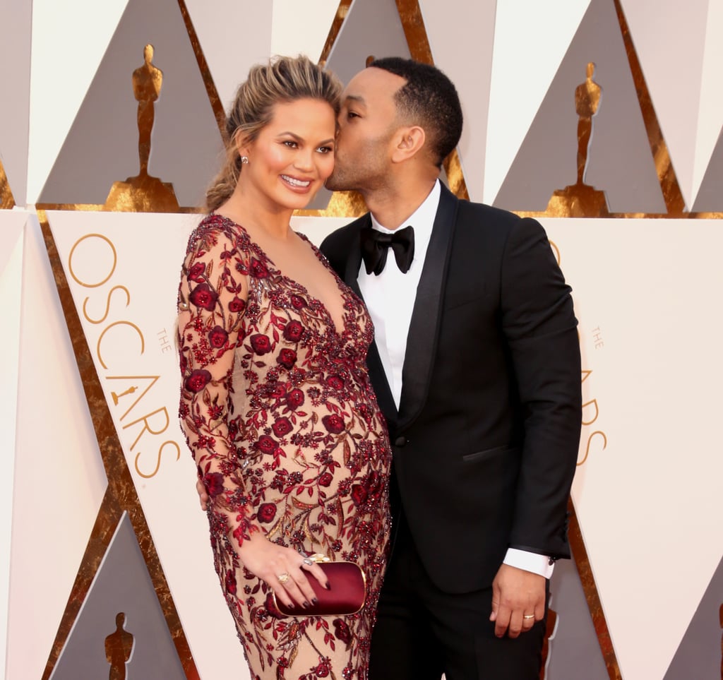 All eyes were on Chrissy Teigen and John Legend when they arrived at the Oscars in LA on Sunday night. The duo, who is currently expecting their first child together, brought their relationship goals to the red carpet, and John even snuck in a quick kiss and helped fix Chrissy's dress while they posed for pictures together. Chrissy's outing comes at the tail end of an exciting week for the supermodel. After celebrating her spread in Sports Illustrated magazine in Miami, John and Chrissy kept the sweet moments coming at her cookbook signing in LA, and most recently, they turned a pre-Oscars bash into a red-hot date night. Read on to see more of the world's most enviable couple, and then check out even more star-studded arrivals.