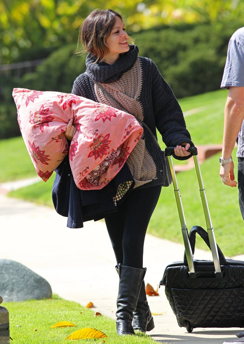 But all those famous friends don't stop her from being just a regular girl. She travels with her own pillow!