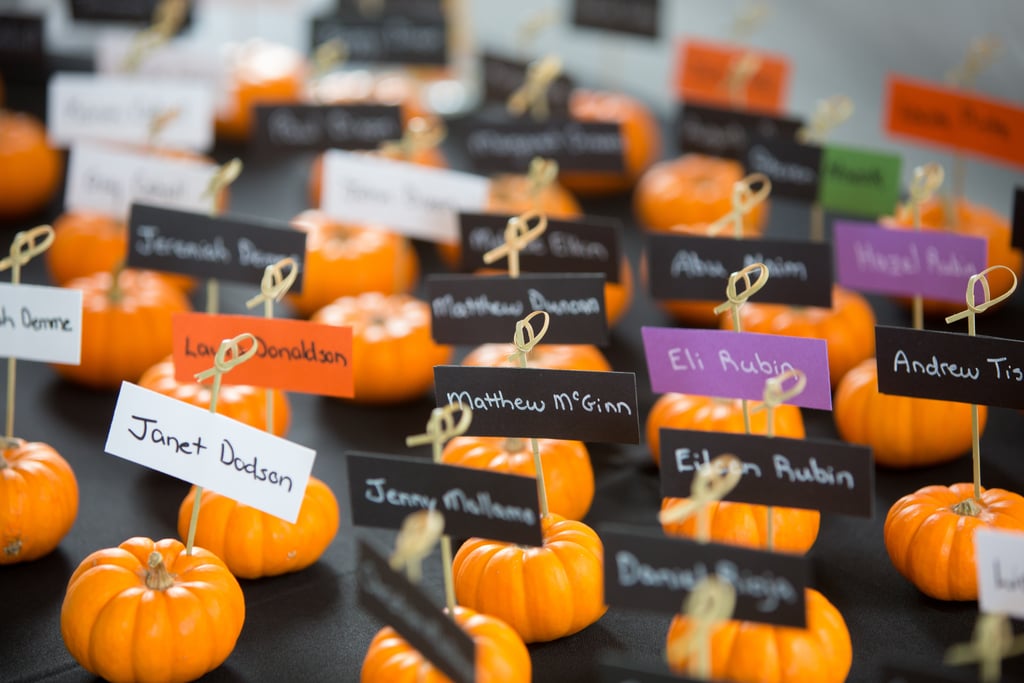 Instead of plain seat assignment cards, direct your guests with adorable mini pumpkins.