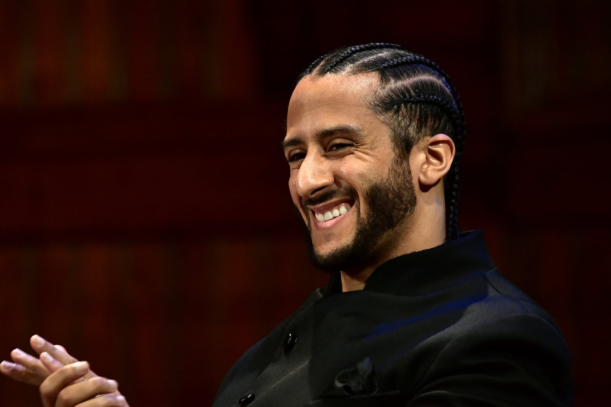 CAMBRIDGE, MA - OCTOBER 11:  Colin Kaepernick on stage at the W.E.B. Du Bois Medal Award Ceremony at Harvard University on October 11, 2018 in Cambridge, Massachusetts.   2018 Honorees included Kehinde Wiley, Florence Ladd, Kenneth Chenault,  Shirley Ann Jackson, Pamela Joyner, Bryan Stevenson, Dave Chappelle and Colin Kaepernick.  (Photo by Paul Marotta/Getty Images)