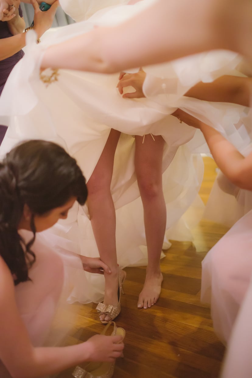 Bride Has To Go To The Bathroom. When The Bridesmaids Lift Her