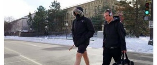 Photo of College Student Wearing Shorts in the Winter