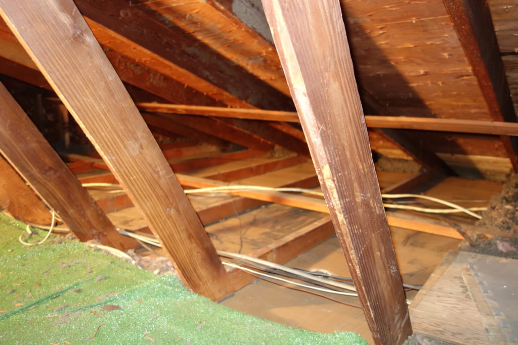 In order to prevent a fire, Brian had to clear all the insulation out of the attic. Nine trash bags and a good sweep later, the job was done. 
Source: Imgur user MRDRC