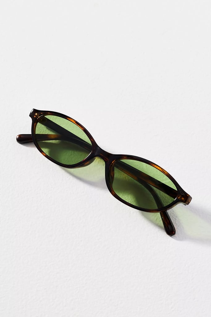 I-Sea Oval East West Sunglasses ($38)
Curious about the micro-glasses trend? This frame emphasizes a wide, sleek design that flatters any face shape with its dainty finish. Choose between a sheer green or light blue lens to help manage glare and lower eye strain.