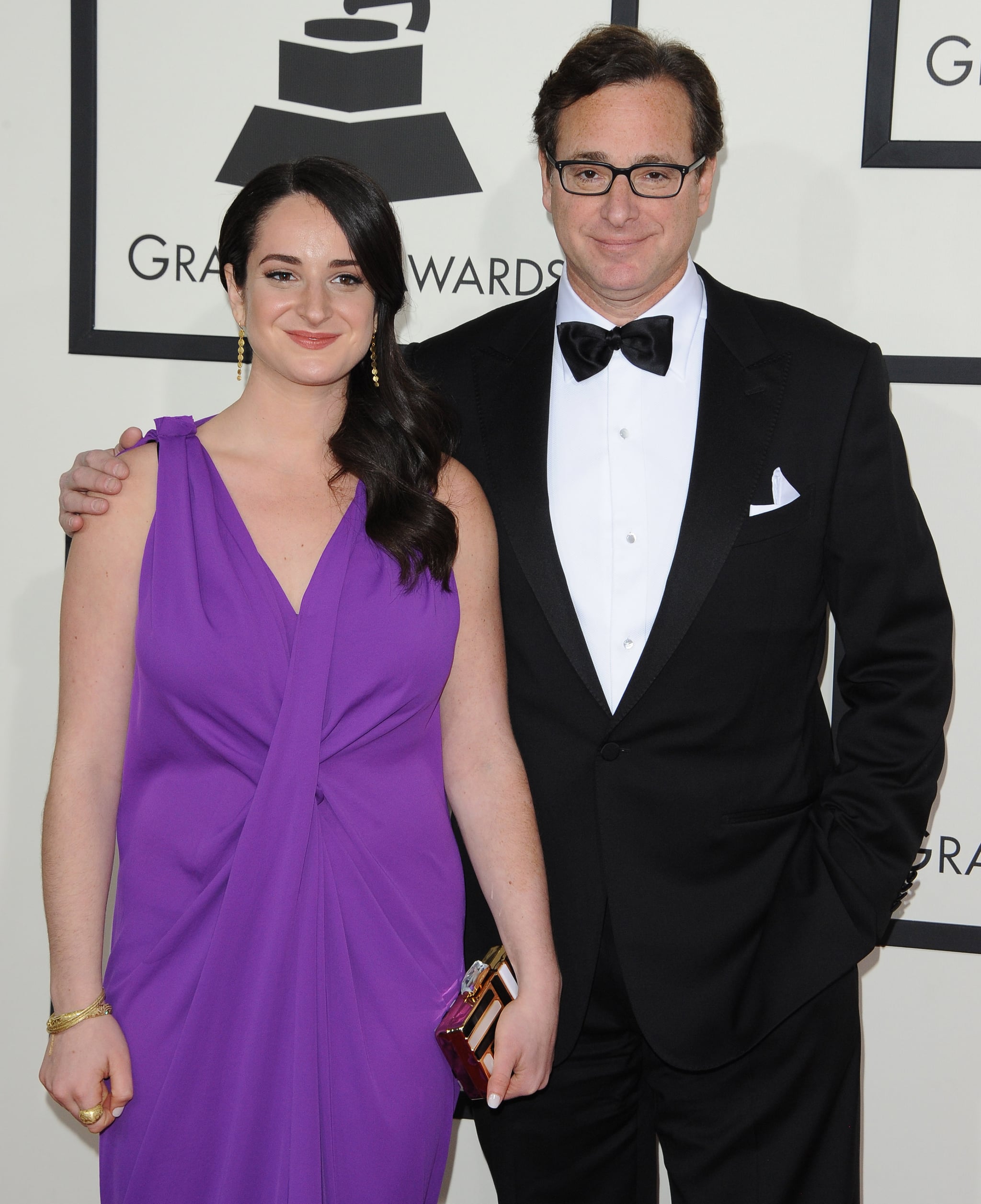 LOS ANGELES, CA - JANUARY 26:  Comedian Bob Saget (R) and daughter Lara Saget arrive at the 56th GRAMMY Awards at Staples Centre on January 26, 2014 in Los Angeles, California.  (Photo by Axelle/Bauer-Griffin/FilmMagic)