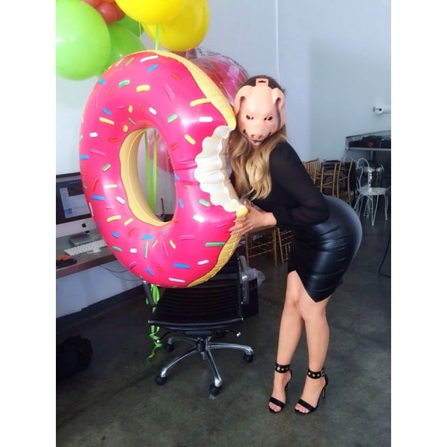 Khloé Kardashian wore a pig mask and posed with a giant inflatable doughnut.
Source: Instagram user khloekardashian