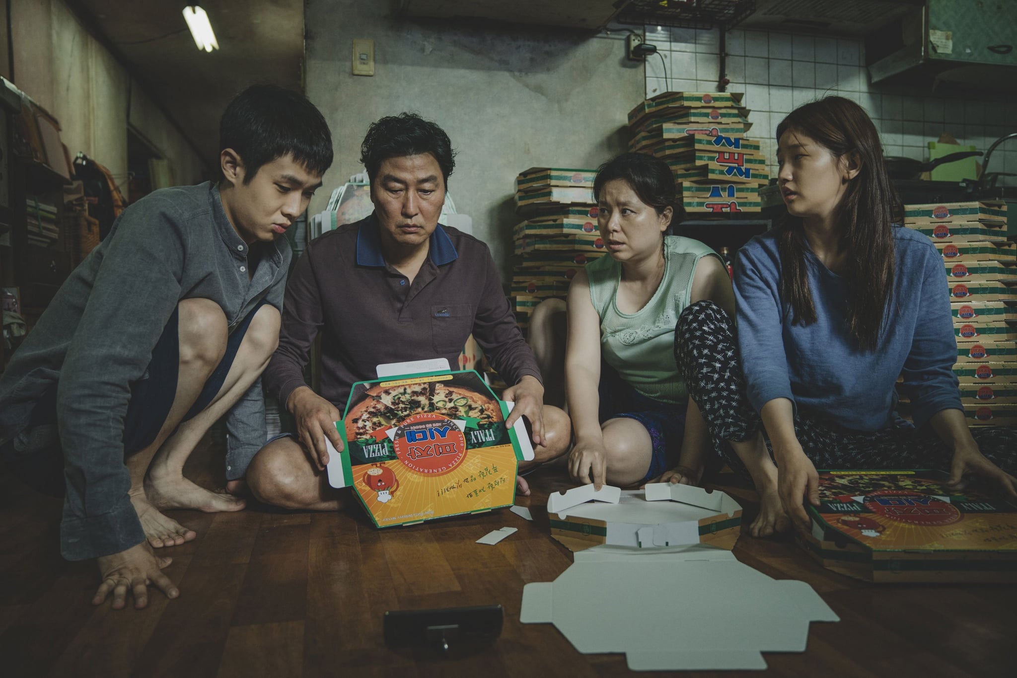 PARASITE, from left: CHOI Woo-sik, SONG Kang-ho, JANG Hye-jin, PARK So-dam, 2019.  Neon / courtesy Everett Collection