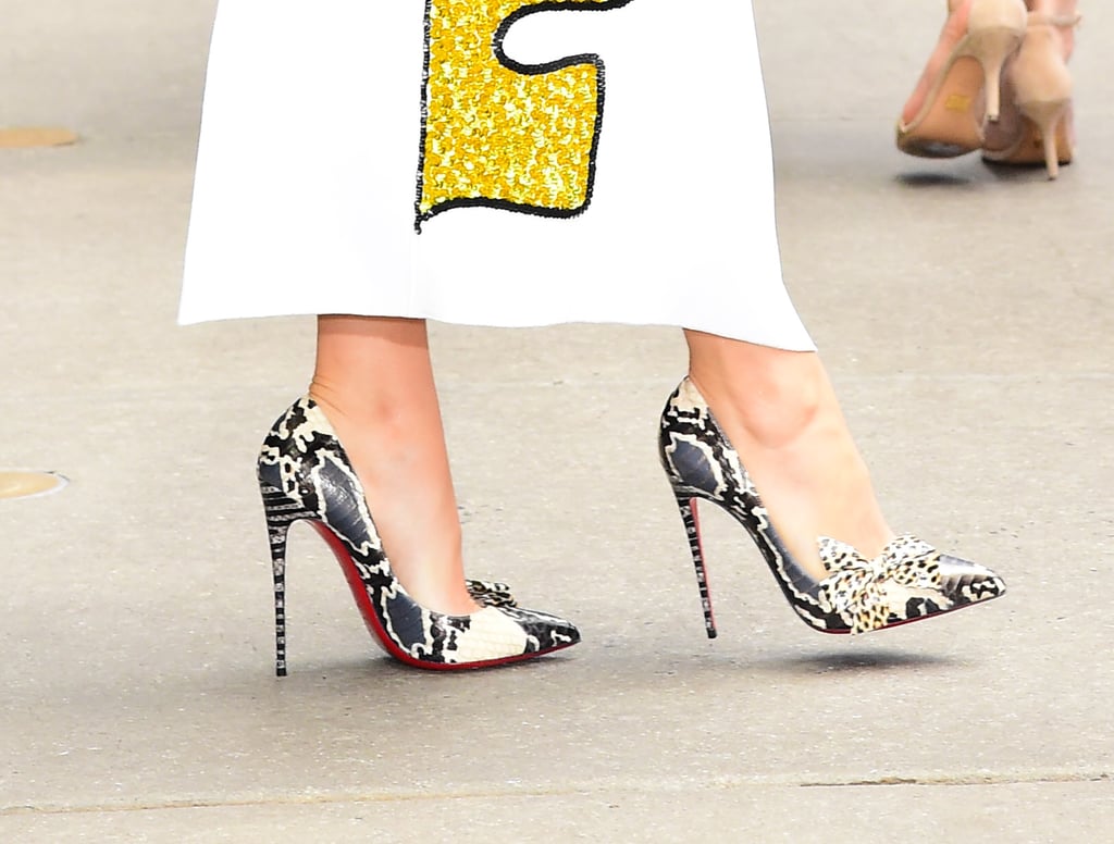 And she slipped into Christian Louboutin heels that came complete with a leopard bow.