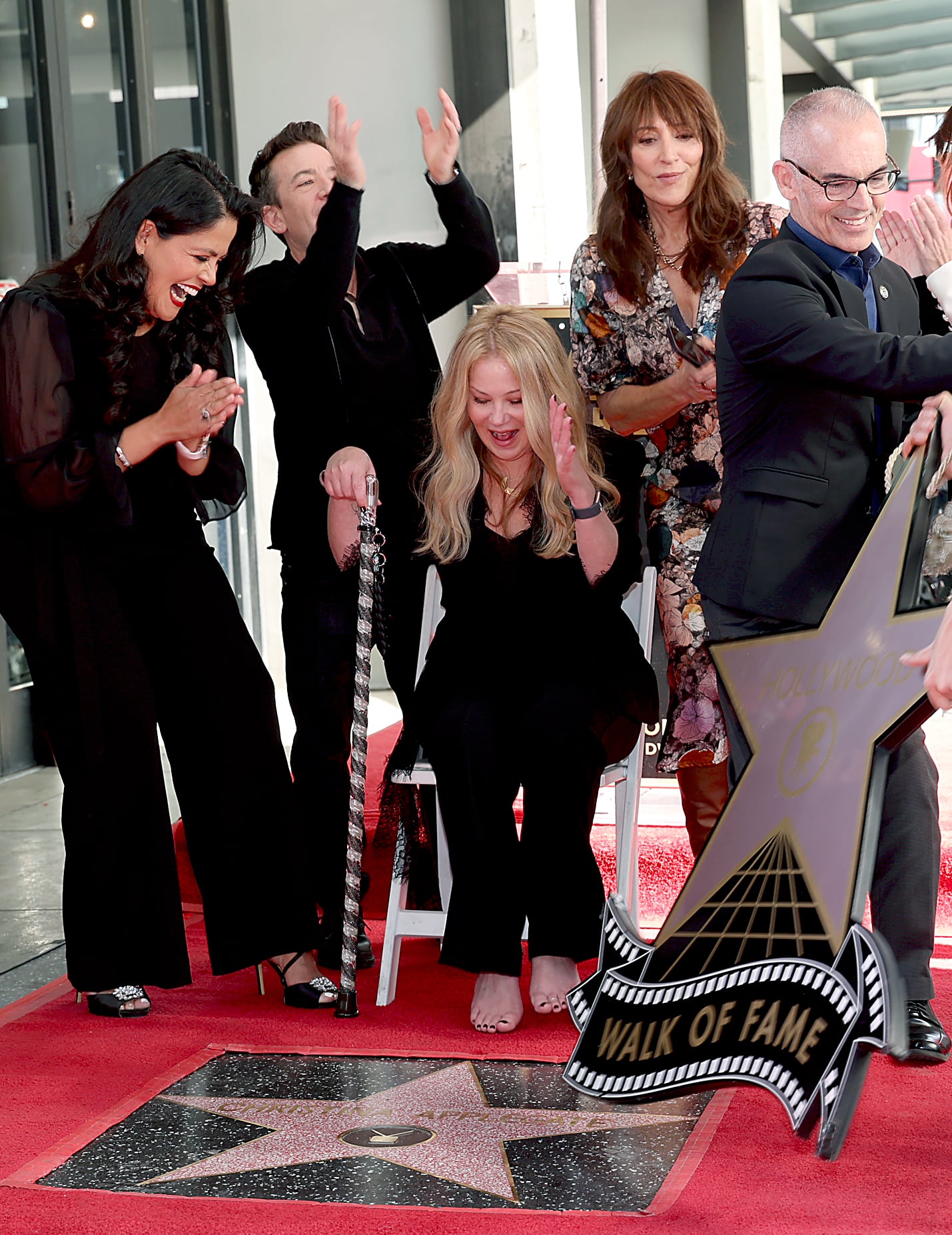 LOS ANGELES, CALIFORNIA - NOVEMBER 14: (L-R) Chair of the Hollywood Chamber of Commerce Lupita Sanchez Cornejo, David Faustino, Christina Applegate, Katey Sagal, and Mitch O'Farrell pose with Christina Applegate's star during her Hollywood Walk of Fame Ceremony at Hollywood Walk Of Fame on November 14, 2022 in Los Angeles, California. (Photo by Phillip Faraone/Getty Images)