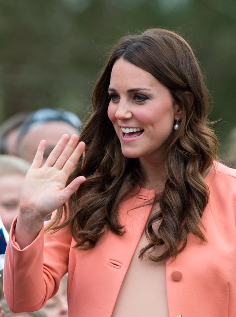 Kate was glowing on a visit to Naomi House earlier this year. She greeted children and their families with well-curled locks and a peachy makeup palette.