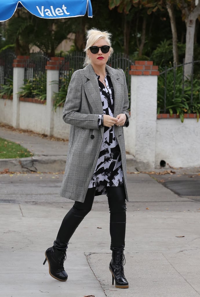 For her sleekest outfits, Gwen's go-to coat of choice is a tailored blazer done long. This gray plaid version has a touch of menswear inspiration but is made for the power woman.