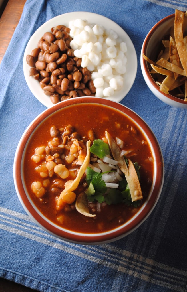 A Mexican vegetarian staple, pozole de frijol is made with hominy, tomatoes, oregano, and pinto beans, for a twist on a classic Latin stew.
