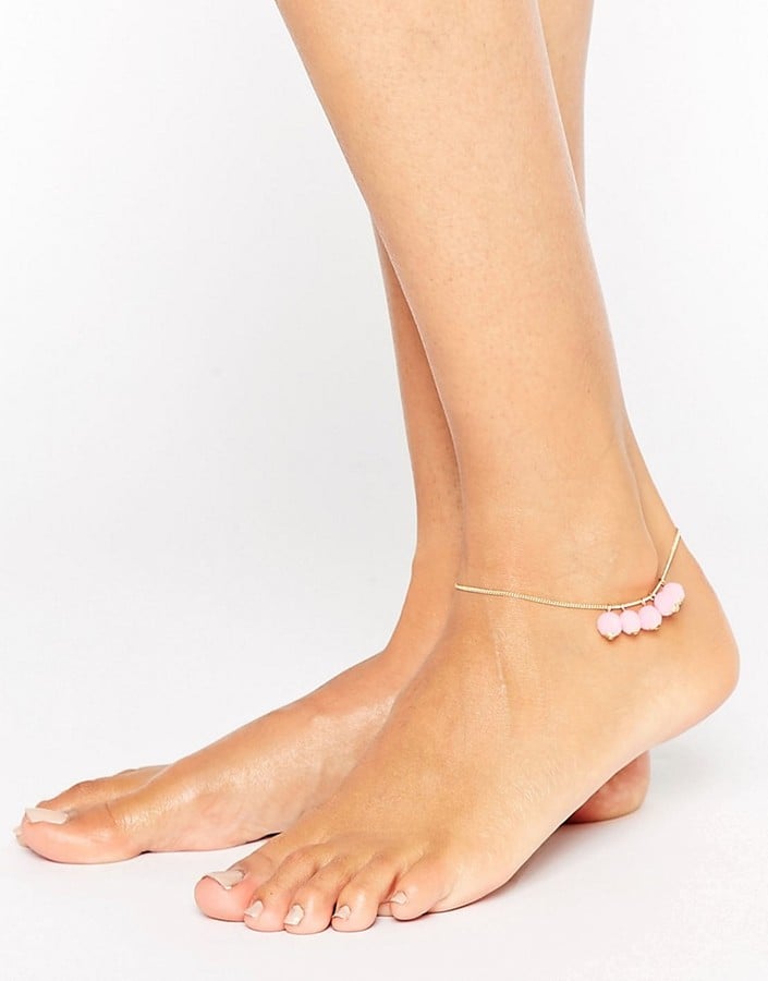 This adorable Asos Fine Chain Pom Anklet ($7) is perfect for pairing with you bikini — and bare feet.