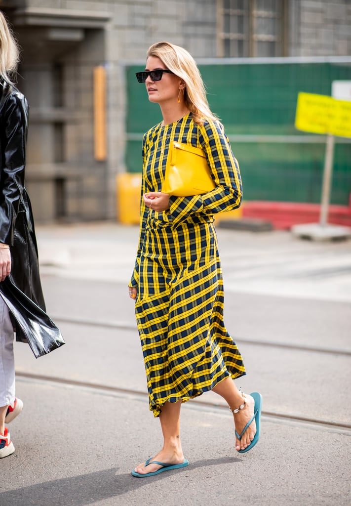 Styling a checkered dress with a blue pair.