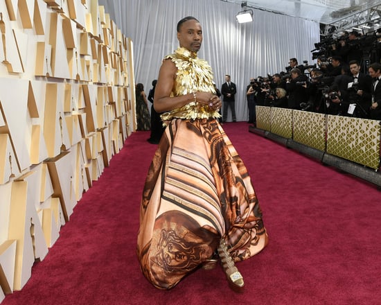 man in a dress at the oscars
