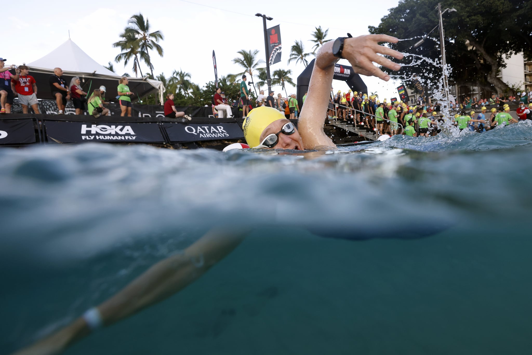 KAILUA KONA, HAWAII - OCTOBER 14: (EDITORS NOTE: Image taken using an underwater camera.) An athlete competes during the swim portion during the VinFast IRONMAN World Championship on October 14, 2023 in Kailua Kona, Hawaii. (Photo by Sean M. Haffey/Getty Images for IRONMAN)