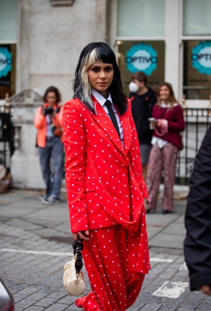 There are suits, and then there are apple-red suits.