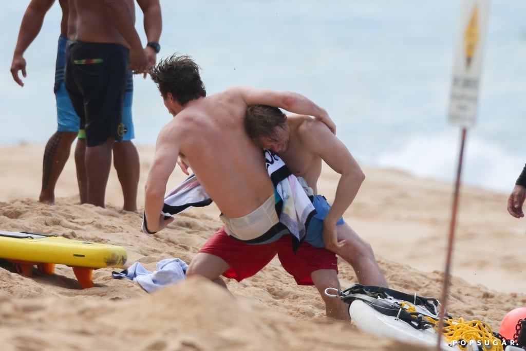 Charlie Hunnam and Garrett Hedlund Wrestle in Hawaii Photos