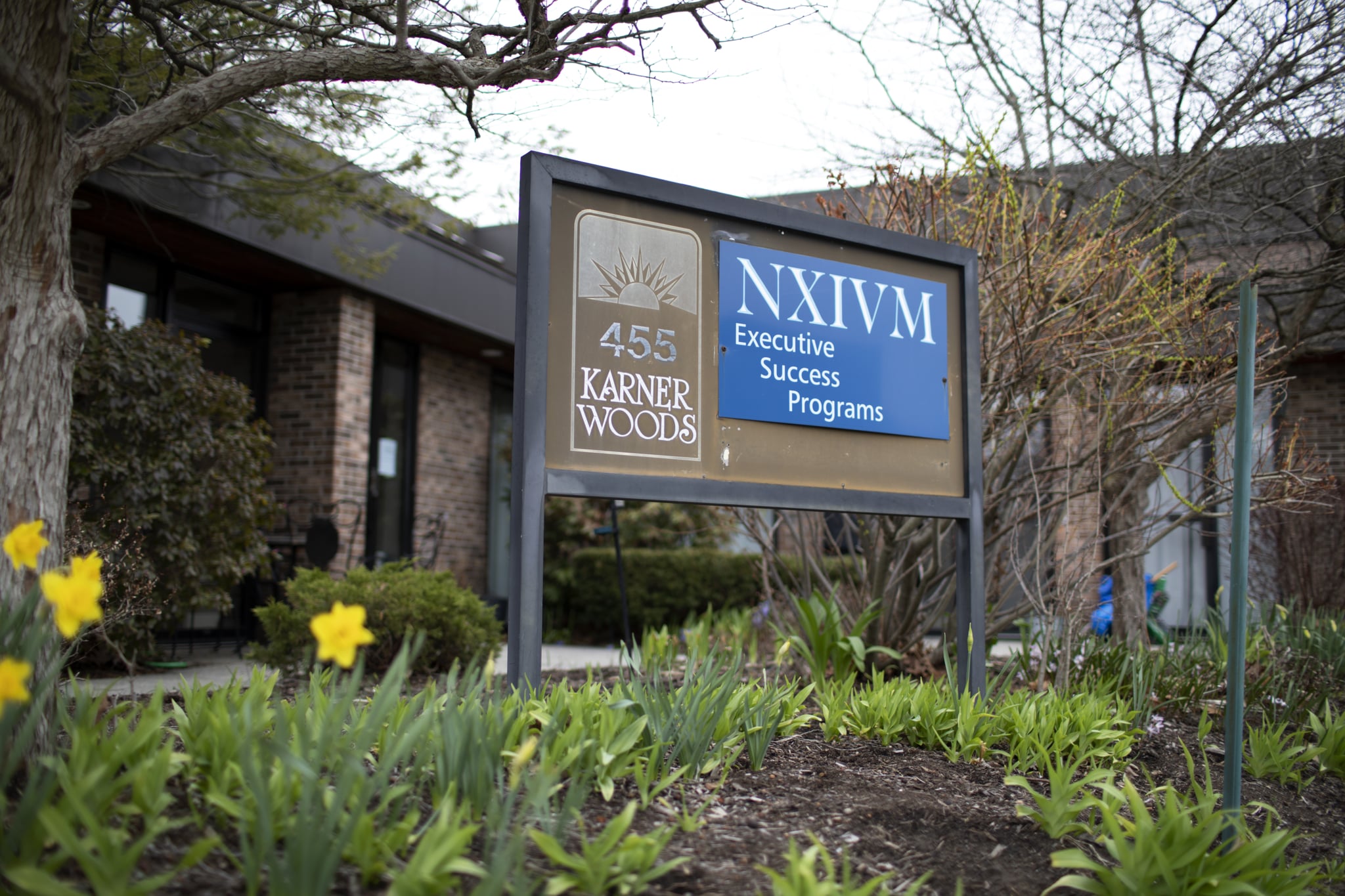 ALBANY, NY - APRIL 26: The NXIVM Executive Success Programs sign outside of the office at 455 New Karner Road on April 26, 2018 in Albany, New York. Keith Raniere, founder of NXIVM, was arrested by the FBI in Mexico in March of 2018. (Photo by Amy Luke/Getty Images)