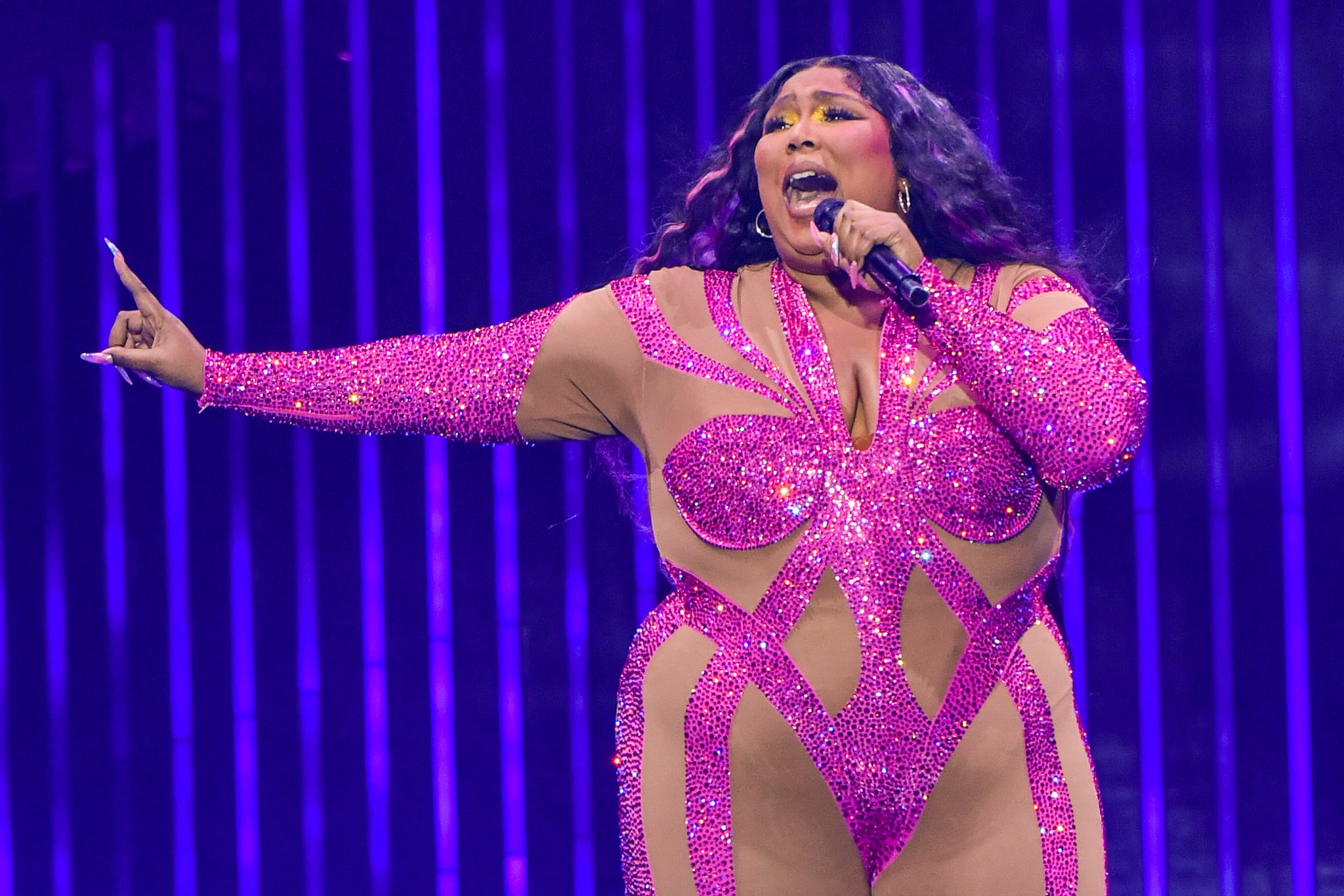 DETROIT, MICHIGAN - OCTOBER 06: Lizzo performs onstage at Little Caesars Arena on October 06, 2022 in Detroit, Michigan. (Photo by Aaron J. Thornton/Getty Images)