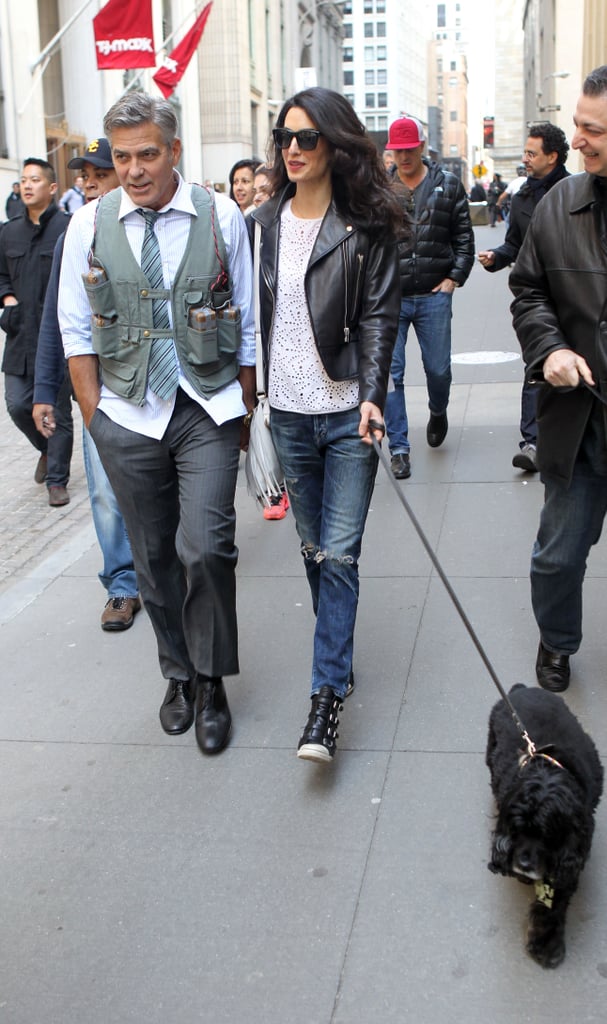 Wearing distressed denim with a leather Balenciaga moto jacket, completing the look with Ash wedge sneakers.