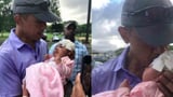 Video of Barack Obama Kissing a Baby on the Head