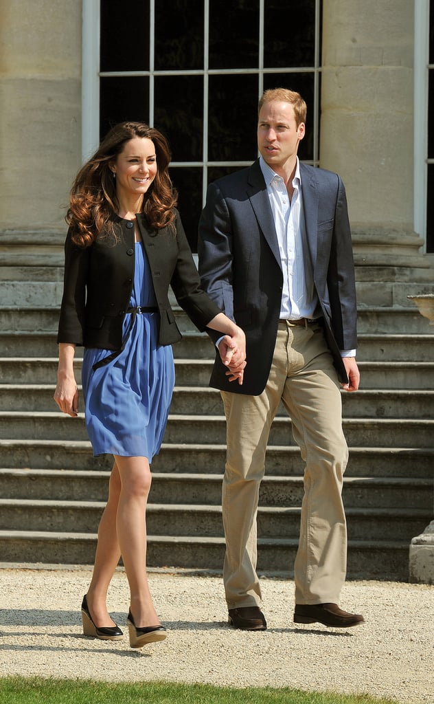 Newlyweds Kate Middleton and Prince William stepped out on the grounds of Buckingham Palace the day after their April 2011 wedding in London.