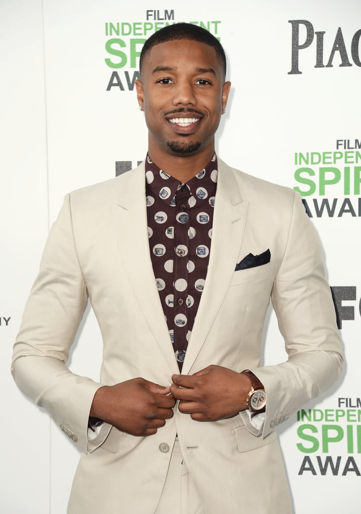 Michael adjusted his jacket on the red carpet at the ...
