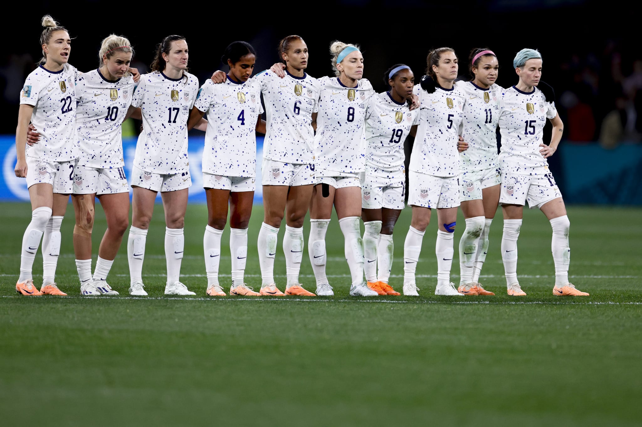 MELBOURNE, AUSTRALIA - AUGUST 06: Megan Rapinoe #15, Kristie Mewis #22, Andi Sullivan #17, Crystal Dunn #19, Lindsey Horan #10, Lynn Williams #6, Naomi Girma #4, Kelley O'Hara #5, and Julie Ertz #8 of the United States react during the penalty kick shootout during the FIFA Women's World Cup Australia & New Zealand 2023 Round of 16 match between Winner Group G and Runner Up Group E at Melbourne Rectangular Stadium on August 06, 2023 in Melbourne, Australia. (Photo by Carmen Mandato/USSF/Getty Images for USSF)