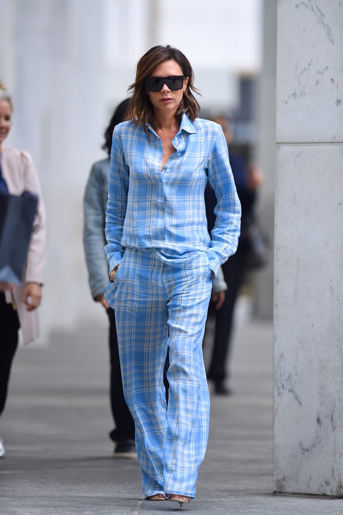 Victoria styled a sky-blue plaid set from her Resort 2018 line while out in Manhattan in June 2017.