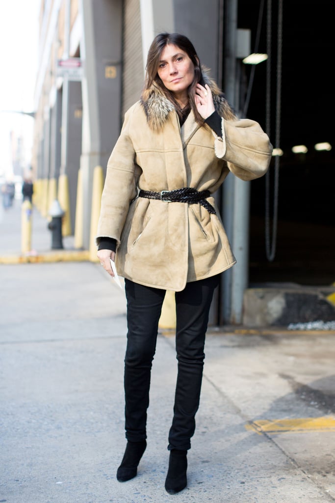 Emmanuelle Alt didn't complicate her Winter look — just showcased a great piece of suede outerwear against understated black pants.