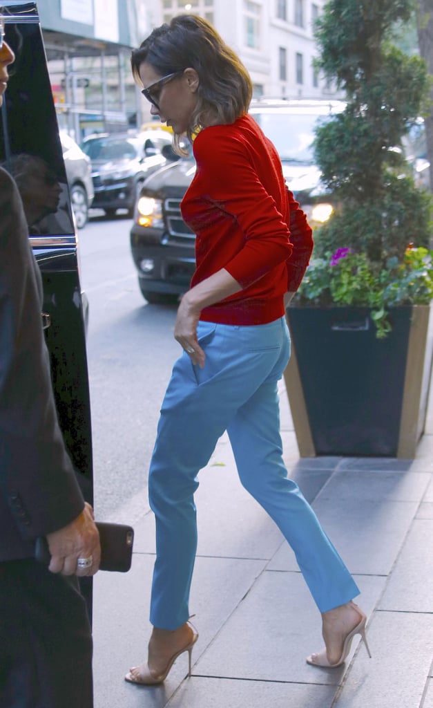 Victoria Beckham Wearing Red Top and Blue Pants June 2016