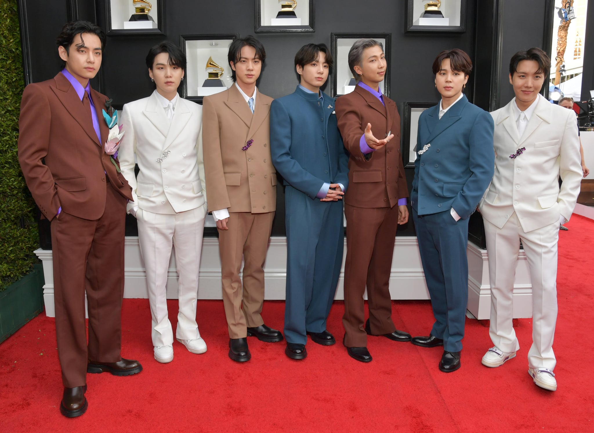 LAS VEGAS, NEVADA - APRIL 03: (L-R) V, Suga, Jin, Jungkook, RM, Jimin and J-Hope of BTS attend the 64th Annual GRAMMY Awards at MGM Grand Garden Arena on April 03, 2022 in Las Vegas, Nevada. (Photo by Lester Cohen/Getty Images for The Recording Academy)