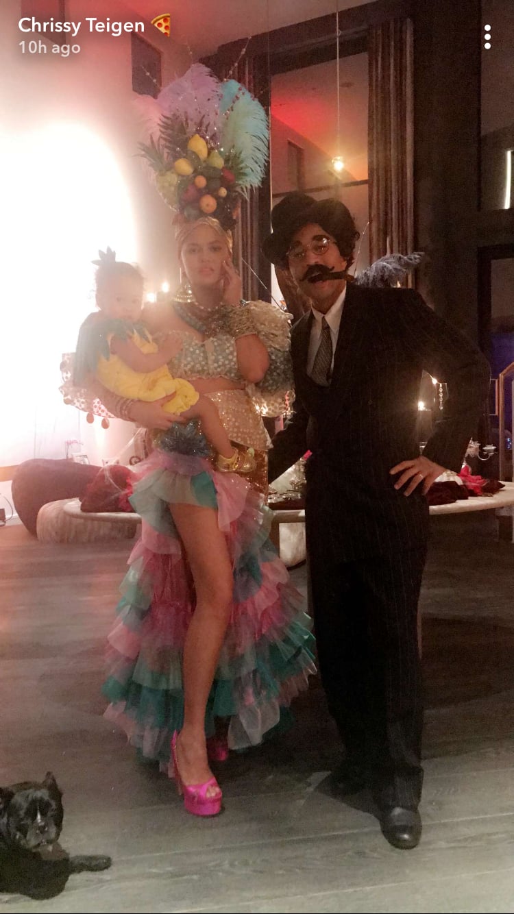 Chrissy Teigen and John Legend as Carmen Miranda and Groucho Marx and Their Daughter, Luna, as a Pineapple