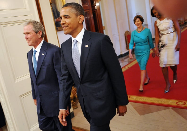 Smiling at the unveiling of the Bushes' presidential portraits in 2012