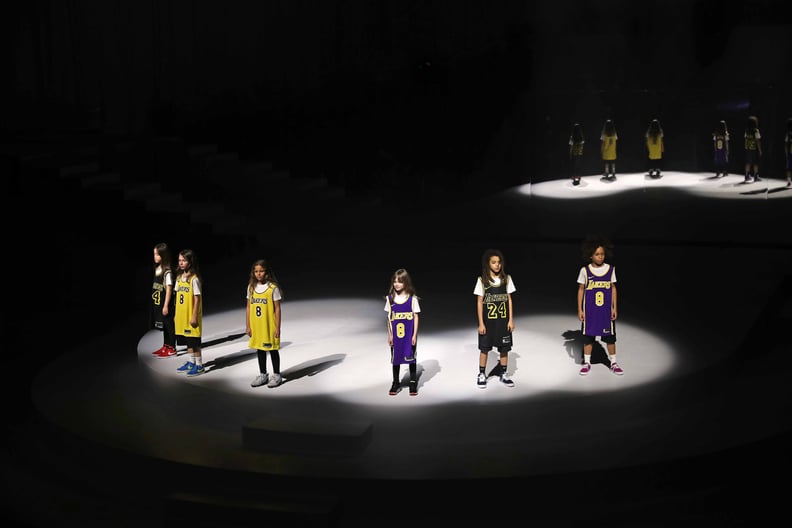 NEW YORK, NEW YORK - FEBRUARY 05: Models are seen honoring Kobe Bryant during the 2020 Tokyo Olympic collection fashion show at The Shed on February 05, 2020 in New York City. (Photo by Bennett Raglin/Getty Images)