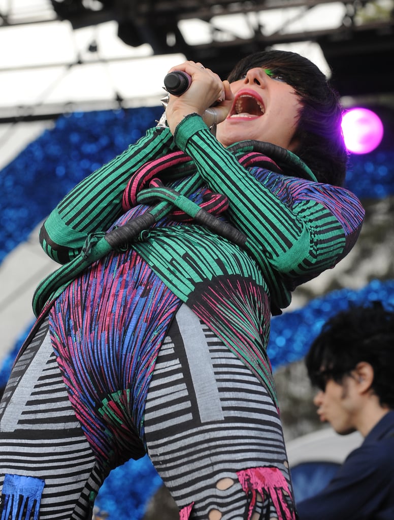 Singing on stage in a bodysuit and tights in 2009.