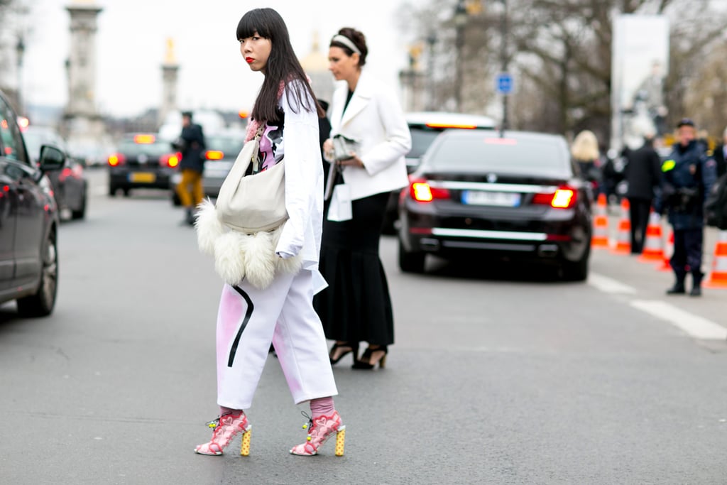 We can't decide what we love more — Susie Bubble's heels or her bag. She knows her way around some all-star accessories.