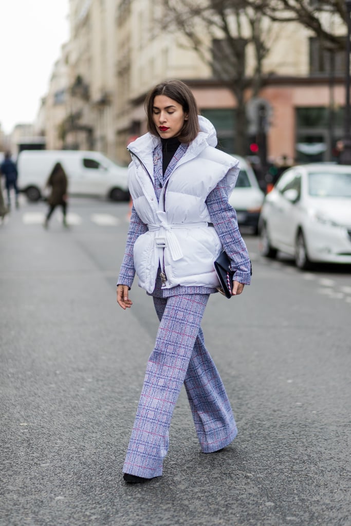 Treat your puffy vest as its own form of outerwear and layer over a pantsuit for that unexpected street style twist.