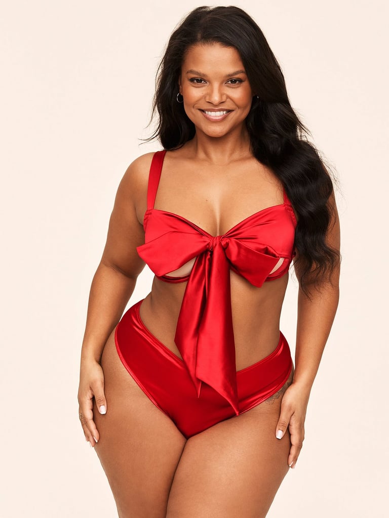 Victoria's Secret Adore Me Gynger Plunge Bra ($55) and Victoria's Secret Adore Me Gynger Bikini Panty ($13)
Nothing says Valentine's Day like satin and an interactive bow at the front and back. Victoria's Secret went all out with its lingerie this year, led by a campaign starring Hailey Bieber. This particular set is from a new partnership with Adore Me and VS, and the unique details are selling us big time.