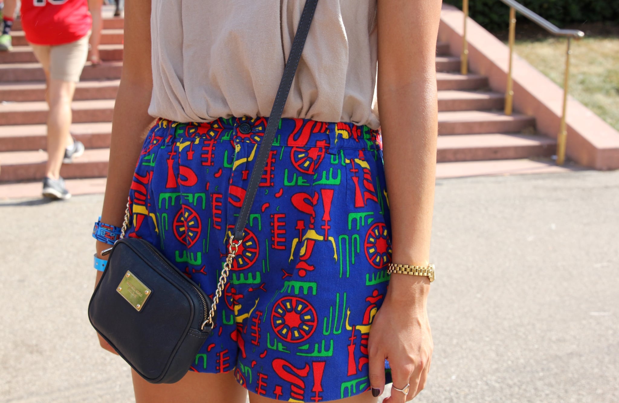 This woman got her mini bag from Michael Kors, but those brightly | The  Lollapalooza Street Style Was Seriously Good Last Year | POPSUGAR Fashion  Photo 58