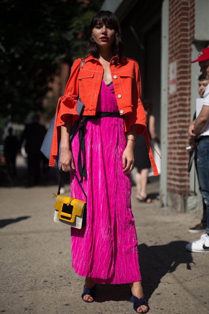 Instead of wearing a traditional denim jacket over your pink dress, wear a red one. The style switch-up is easy to pull off, as Natalie Suarez showed here. She also wore M Missoni's "Maxi Tote" for an extra pop of color.