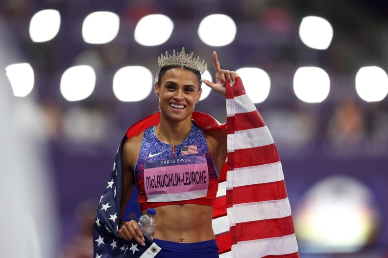 Sydney McLaughlin-Levrone of Team United States celebrates winning the gold medal with the new World Record by wearing a crown after competing in the Women's 400m Hurdles.