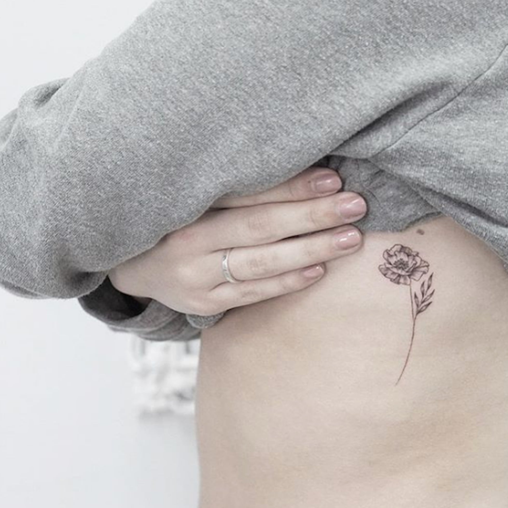 10 Flower Tattoo Ideas: Symbolism, Placements (With Photos) - Parade