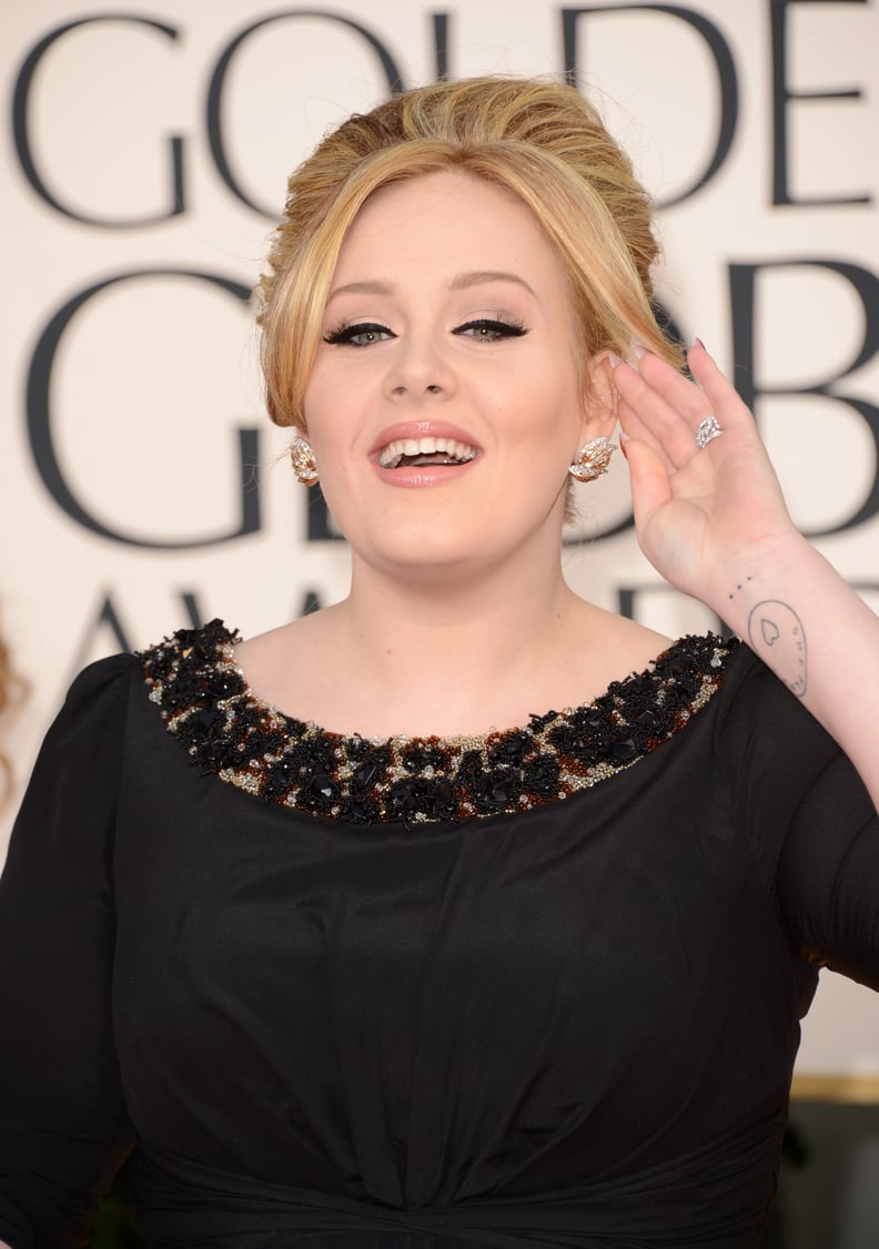 Adele's Coin and Ellipsis Tattoos