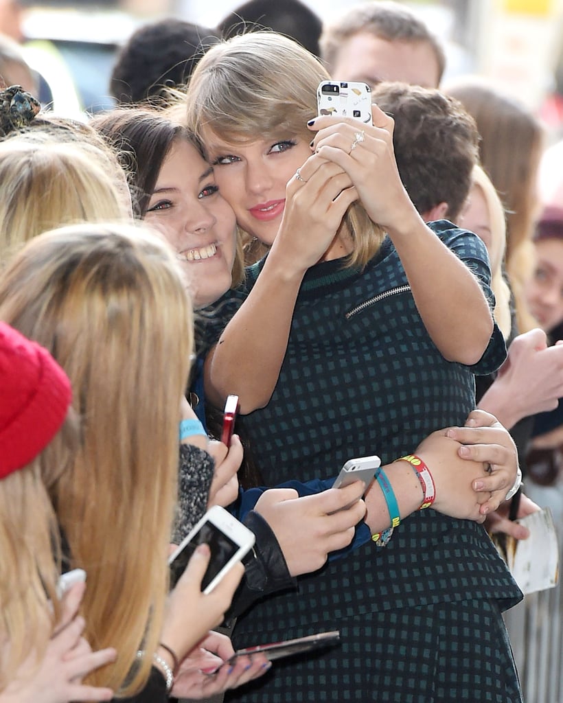 Taylor Swift took a selfie with a fan in London on Thursday.
