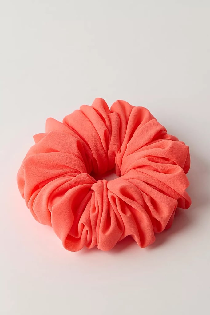 Kaxi Co. Chiffon Jumbo Scrunchie ($18)
Never underestimate the power of an oversized scrunchie. It's the perfect way to add a little practical playfulness to a summer look, plus it helps tucks your strands away on extra hot days. This silky jumbo design comes in six different colorways and is a best seller on the site.