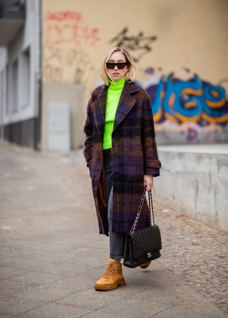Keep It Casual With Jeans Styled With Brown Combat Boots and a Neon Turtleneck