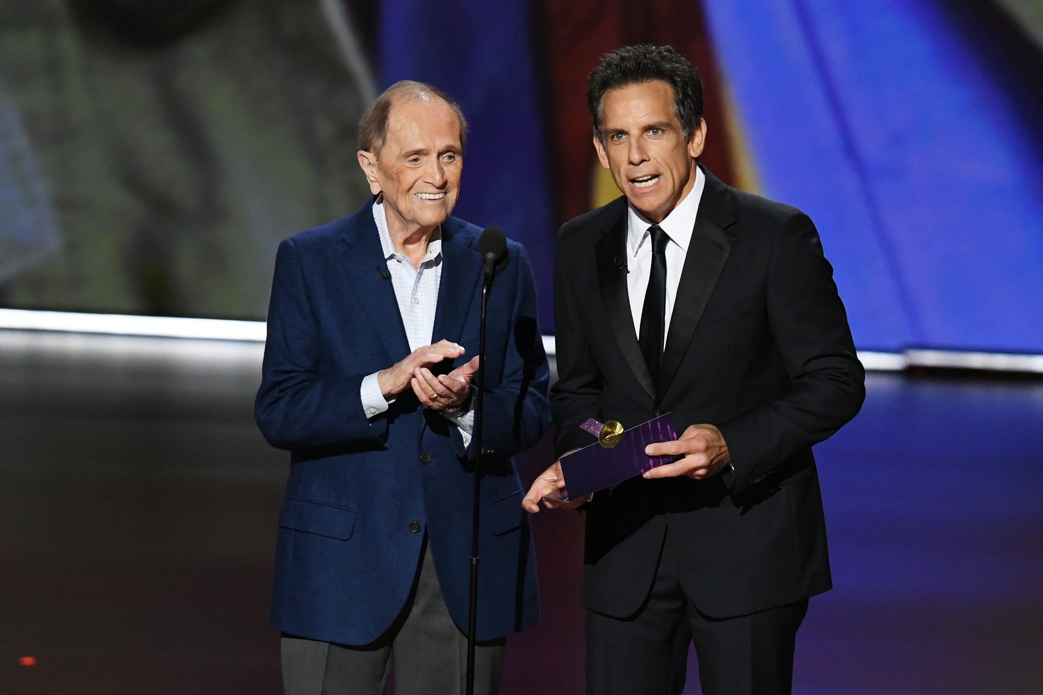 LOS ANGELES, CALIFORNIA - SEPTEMBER 22: (L-R) Bob Newhart and Ben Stiller speak onstage during the 71st Emmy Awards at Microsoft Theatre on September 22, 2019 in Los Angeles, California. (Photo by Kevin Winter/Getty Images)